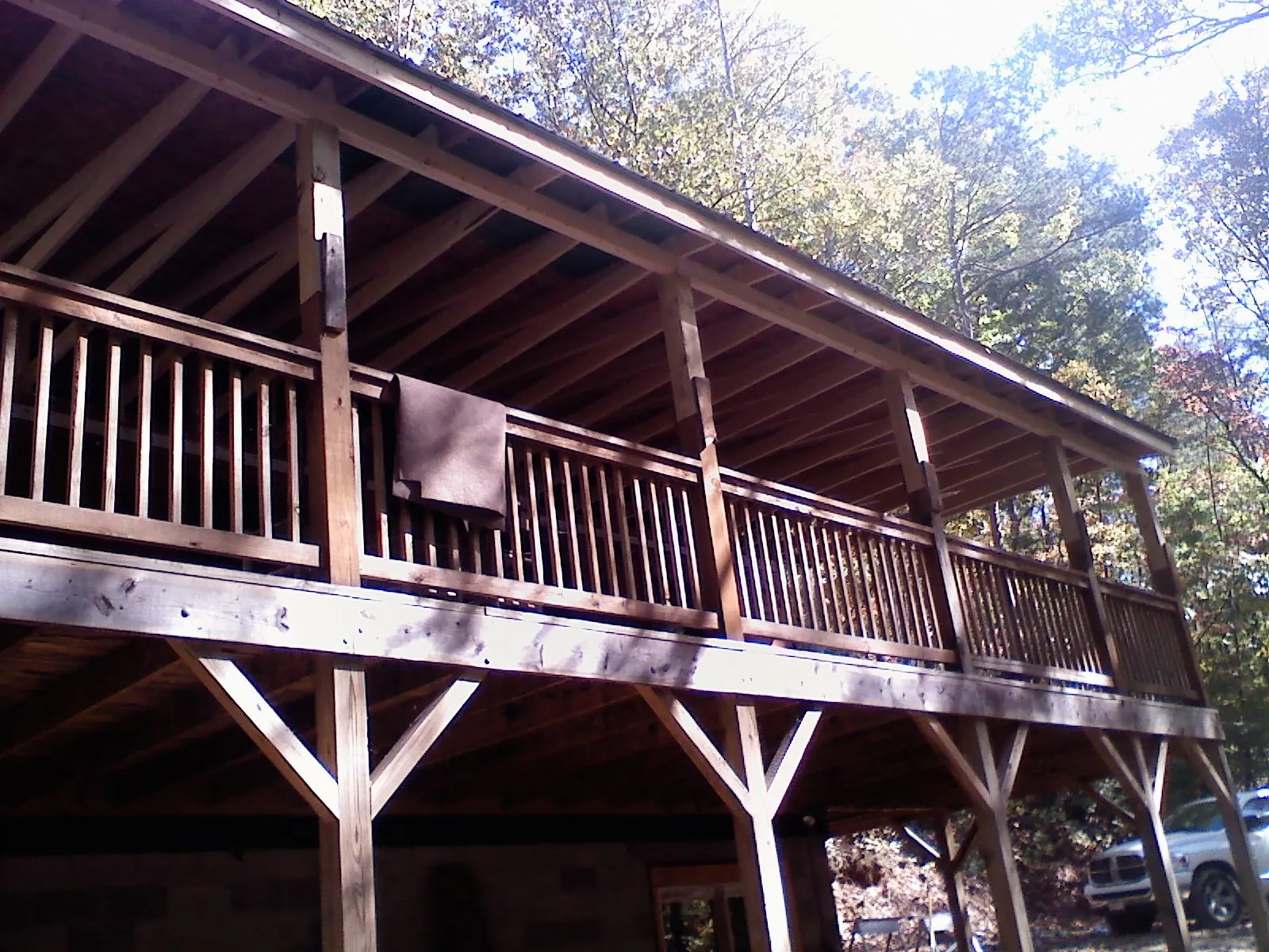 Timber framing under a new elevated porch and deck — Roof Leak Repair in Gainesville by Roofing Brothers